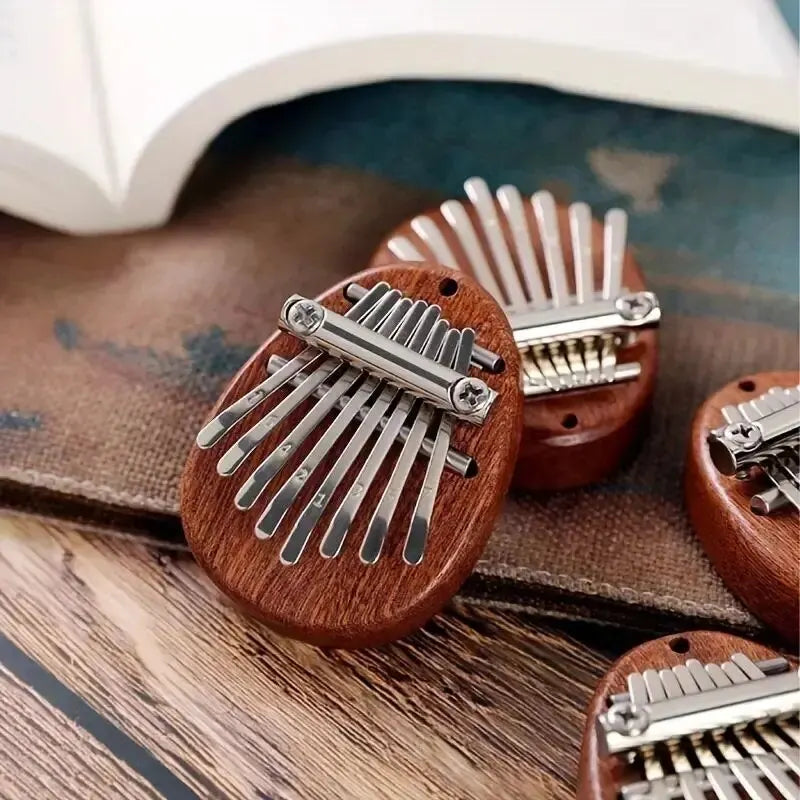 Exquisite Mini Wooden Kalimba - 8 Key Finger Piano Pendant Gift for Music Lovers