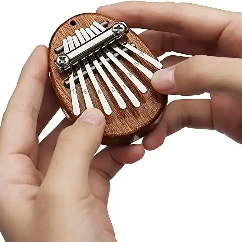 Exquisite Mini Wooden Kalimba - 8 Key Finger Piano Pendant Gift for Music Lovers